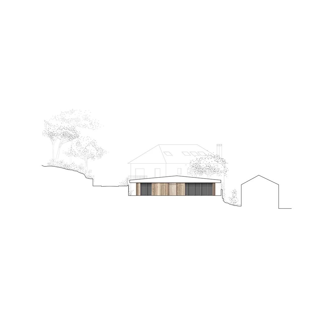 Coupe d’une maison existante et de son extension basse en bois
